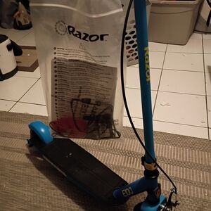 Razor Blue Scooter with Black Deck and Yellow Logo Accents